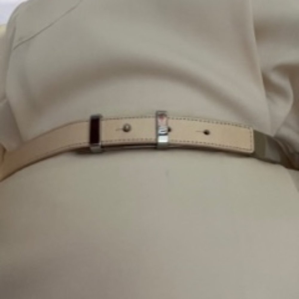 Worth New York Off white leather and silver belt.